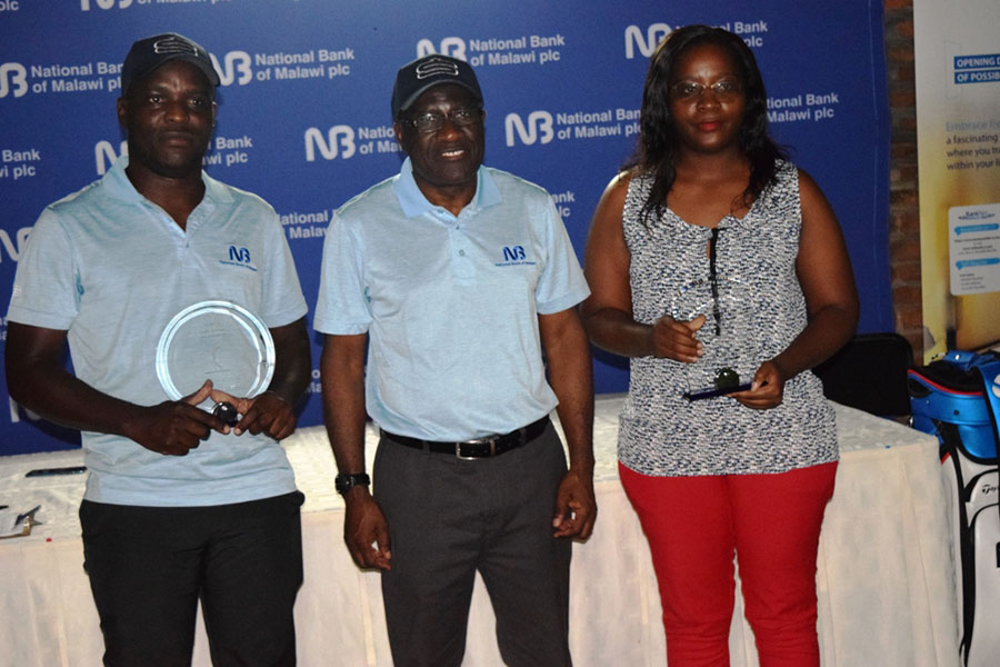 Kawawa middle poses with the winners