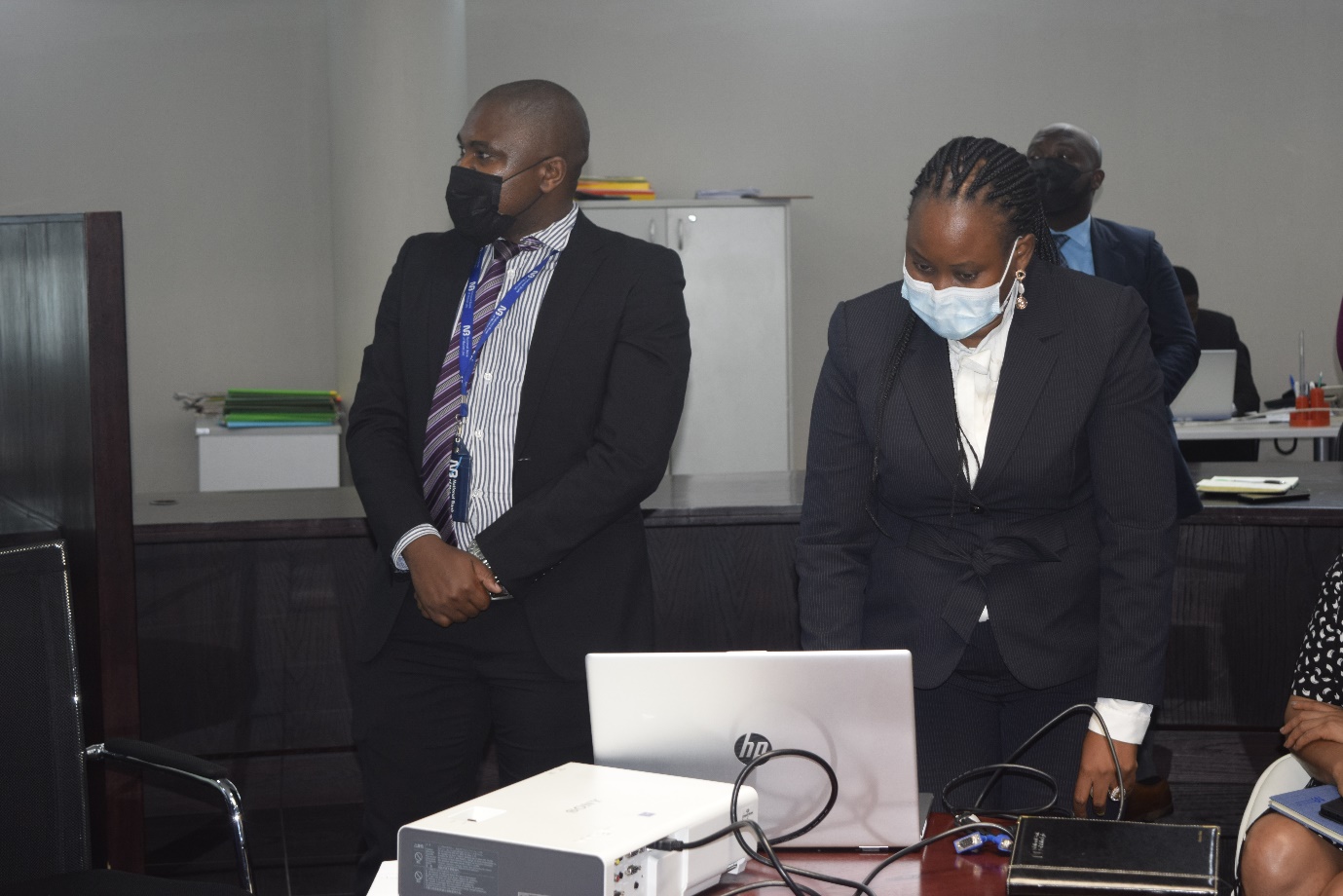 MHC official Kondwani Nyirenda draws a winner as NBM staff look on MHC official Kondwani Nyirenda draws a winner as NBM staff look on