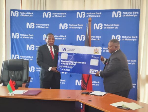 NBM donates K300 million to Government to fight hunger